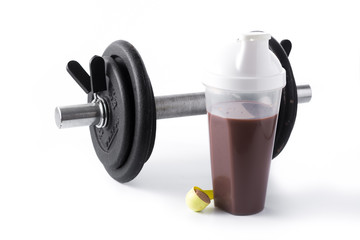 Chocolate protein shake and dumbbell isolated on white background