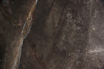 Natural stone brown marble with thin veins, called Bronze Amani
