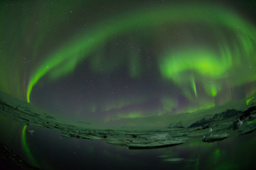Fototapeta na wymiar Beautiful Aurora Borealis in winter