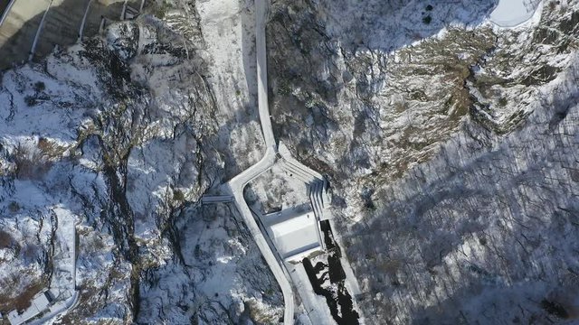  4K aerial footage with dam lake Vidraru in Romania during winter