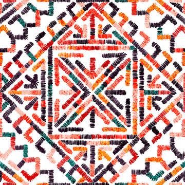 Embroidered seamless geometric pattern. Ornament for the carpet. Ethnic and tribal motifs. Colorful print of handmade. Vector illustration.