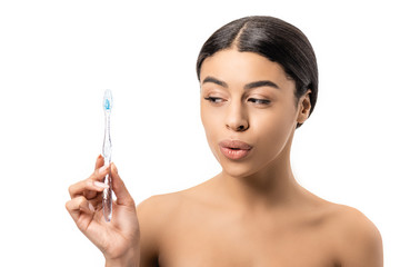 beautiful naked african american girl holding toothbrush isolated on white