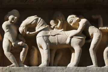 Erotic sculptures at Vishvanatha Temple at the  Western temples of Khajuraho in Madhya Pradesh,...