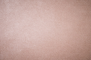 Fototapeta premium Textured background surface of textile upholstery furniture close-up. burlap beige color fabric structure
