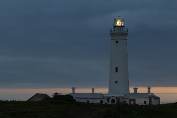 Fototapeta na wymiar Seal Point lighthouse in Cape St Francis in the early evening