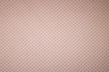 Textured background surface of textile upholstery furniture close-up. burlap beige color fabric structure