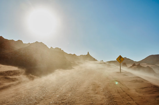 Chile, Valle de la Luna, San Pedro de Atacama, sand track in sandstorm