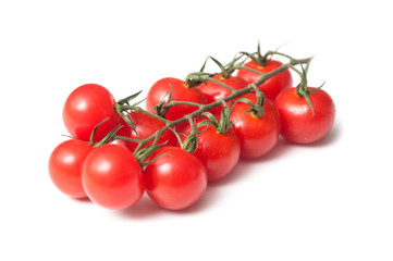 closeup of cherry tomatoes on white background