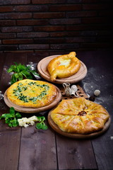 different dishes on a wooden background in Oriental style