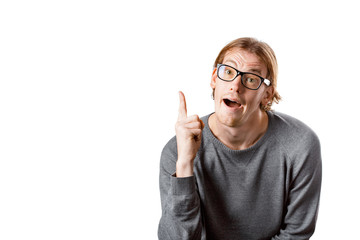 Male portrait of a fair-haired man of European appearance, on a white background. Emotions. Nerd...