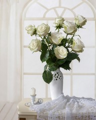 Still life with bouquet of white roses