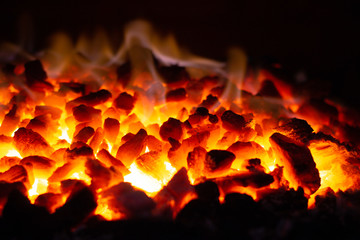 Abstract background of glowing coals in fireplace with fire flames. Burning flame background - Powered by Adobe