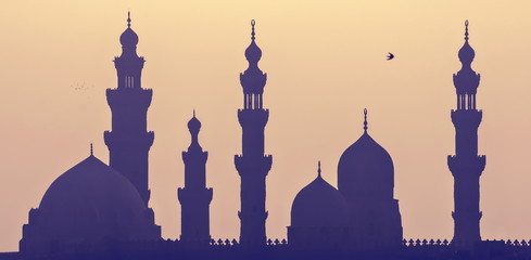 silhouette of mosque in sunset, Cairo, Egypt