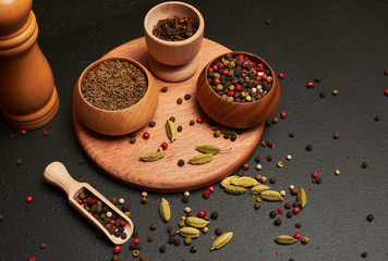 pepper and salt wood background