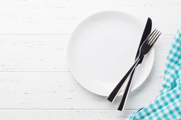 Empty plate with cutlery