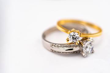 Engagement diamond wedding ring group on white background, diamond, golden rings