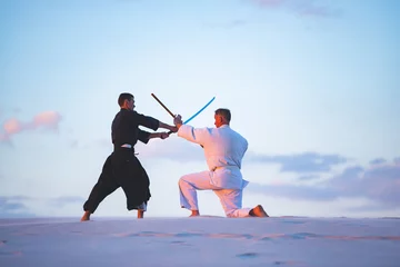 Fotobehang Vechtsport Concentrated men, in Japanese clothes, are practicing martial arts  © sanechka