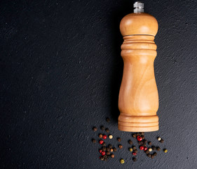 pepper with sweet pepper on a wooden background