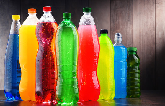 Plastic bottles of assorted carbonated soft drinks