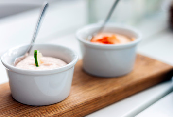 Sauces in small bowls for traditional meze dinner