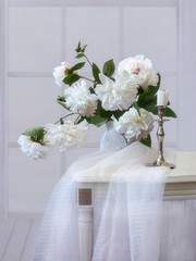Still life with bouquet of white peonies