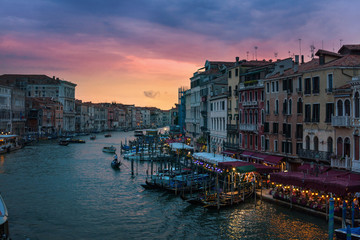 Amazing view of Grand Canal with gondolas at sunset. Venice, Italy