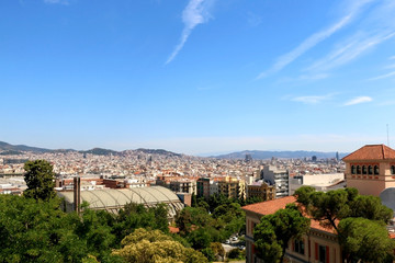 Fototapeta premium Aerial view of Barcelona, Spain from Montjuïc hill on a sunny day. 