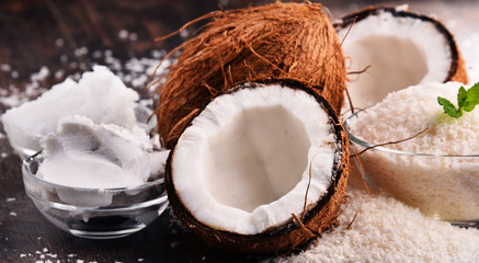 Composition with bowl of shredded coconut and shells