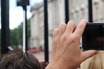 man/tourist using smartphone