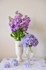 floral arrangement for interior decoration, table setting for a wedding or to create a home cosiness. use as background. lilac hydrangea