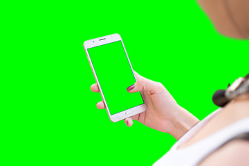 Girl work on smart phone. Isolated in green. Mockup for video editors.