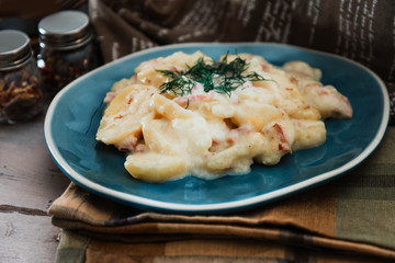 Gratin Of Potatoes, Ham, Eggs And Onions