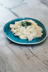 Gratin Of Potatoes, Ham, Eggs And Onions