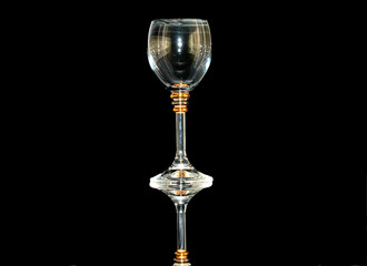 empty wine glass on black background