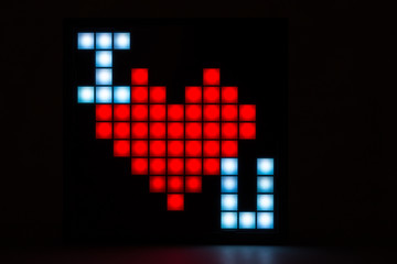 The inscription I love you in the form of pixels on a black background