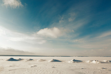Fototapeta na wymiar snowy expanses under the blue sky
