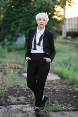 beautiful businness woman fashion portrait in classic costume and red lips