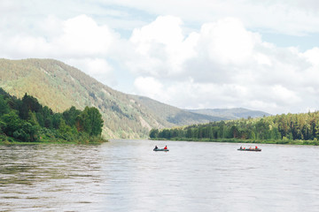 Fototapeta na wymiar river rafting on rubber boats