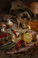 Composition of various foodstuffs on a wooden table. Top view.