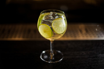 Big and elegant cocktail glass with fresh sour and sweet citrus cocktail
