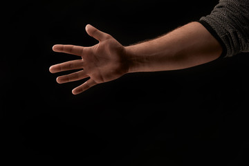 cropped view of man isolated on black