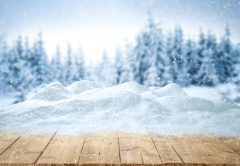 Table background with snow and free space for your decoration 