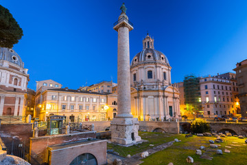 Fototapeta na wymiar Triumphal Trajan Column in Rome at night, Italy