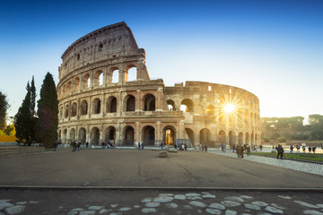 Fototapeta na wymiar The Colosseum in Rome at sunrise, Italy