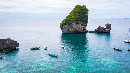 adventure style hi season thai and foreign travel trip tourists long tail boat and driving see coral
