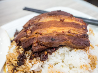 Roasted sweet pork with rice and sauce in Hong Kong style