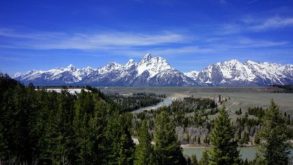 Snow capped Grand Tetons from the Snake River Overlook on a clear day