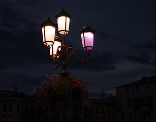 Fototapeta na wymiar A streetlamp in the night. Padua, Veneto, Italy