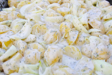 raw potatoes in sauce