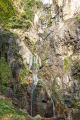 Obraz premium Autumn view of Samodivsko praskalo waterfall, Rhodope Mountains, Bulgaria